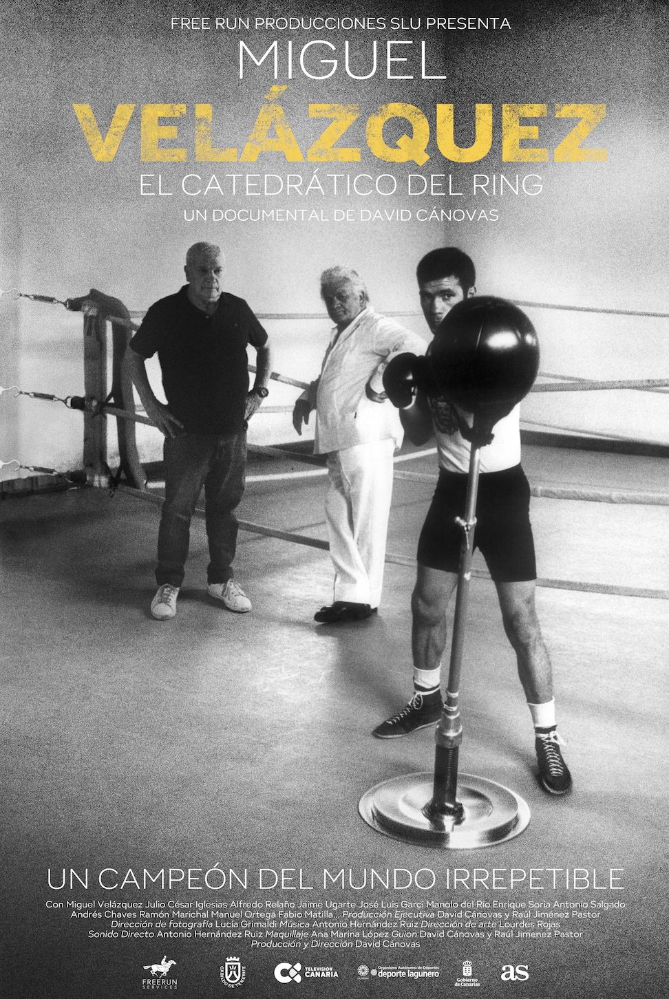 Cartel del segundo largometraje del cineasta tinerfeño David Cánovas: un magnífico documental que orbita sobre la figura del púgil Miguel Velázquez, sobre los compañeros que lo acompañaron en un viaje de ida y vuelta y sobre una ciudad, Santa Cruz de Tenerife, que es el tercer personaje de esta historia universal, fascinante y conmovedora.